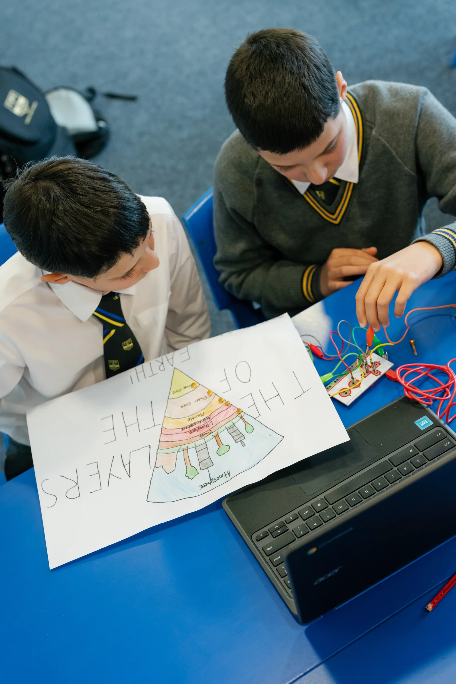 Two Coogee Prep boys building a circuit for a science and technology project